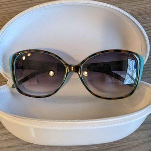 Teal and leopard print Jessica Simpson sunglasses with case
